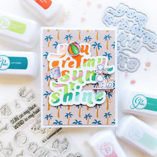 Load image into Gallery viewer, Catherine Pooler - Layered Word Dies - My Sunshine. This word die cuts a frame for the phrase "you are my sunshine" that can be used open or with the letters inlaid back inside for more color contrast. Available at Embellish Away located in Bowmanville Ontario Canada. Example by Catherine Pooler Designs.