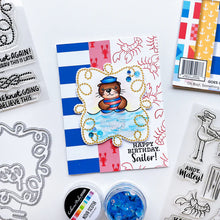Charger l'image dans la galerie, Catherine Pooler - Stamp & Die Set - Ahoy Matey. Get ready for a swashbuckling good time in your crafty space! The Ahoy Matey Stamp Set and its coordinating dies includes a cast of the cutest North East Coast fisherman you have ever seen! Available at Embellish Away located in Bowmanville Ontario Canada. Example by brand ambassador.