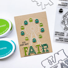 Load image into Gallery viewer, Catherine Pooler - Stamp & Die Set - At the Fair. The icon of the fair coming to town is the Ferris Wheel. The At the Fair Stamp Set and coordinating dies features a Ferris Wheel stamp with a fill in for each car. Available at Embellish Away located in Bowmanville Ontario Canada. Example by brand ambassador.