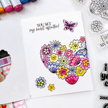 Charger l'image dans la galerie, Catherine Pooler - Stamp & Die Set - Hearts Aflutter. Set someone's heart aflutter with this beautiful stamp set and coordinating dies! The Hearts Aflutter Stamps features a large, line-art heart made of flowers and a butterfly. Available at Embellish Away located in Bowmanville Ontario Canada Example by brand ambassador.