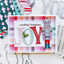 Cargar imagen en el visor de la galería, Catherine Pooler - Stamp & Die Set - Nutcracker Sweet. Meet the cutest nutcrackers in town! This whimsical set features charming nutcrackers adorned in a delightful array of sweets and treats, including cupcakes, candy canes, and figgy pudding. Available at Embellish Away located in Bowmanville Ontario Canada. Example by Catherine Pooler Designs.