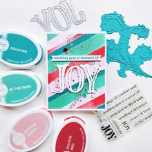 Load image into Gallery viewer, Catherine Pooler - Word Die - Festive Joy. Celebrate the season with the Festive Joy Word Die! This beautiful large "JOY" die can serve as the focal point of your holiday cards, adding a bold and cheerful touch. Available at Embellish Away located in Bowmanville Ontario Canada. Example by Catherine Pooler Designs.