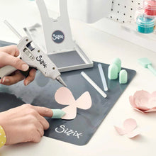 Charger l'image dans la galerie, Sizzix - Glue Gun. Forget the mess! The Sizzix Glue Gun was designed to bond and adhere materials on a variety of surfaces for plenty of good clean fun. Available at Embellish Away located in Bowmanville Ontario Canada.