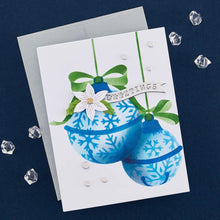 Load image into Gallery viewer, Spellbinders - Stencil By Bibi Cameron Snowflakes - Snowflake Ornaments. Snowflake Ornaments Stencil is part of the Bibi's Snowflakes Collection by Bibi Cameron and comes in a set of two 6 x 9-inch layering stencils and two masks. Available at Embellish Away located in Bowmanville Ontario Canada. Example by brand ambassador.