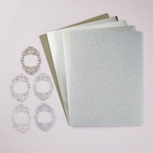 Charger l'image dans la galerie, Spellbinders - Treasured Cardstock 8.5"X11" - 15/Pkg - Silver. 15 premium cardstock sheets includes 3 sheets each: glitter metallic (100 lb), matte metallic (85 lb), brushed metallic (85 lb), mirror metallic (85 lb), and pearl metallic (92 lb). Available at Embellish Away located in Bowmanville Ontario Canada.