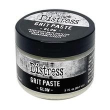 Cargar imagen en el visor de la galería, Tim Holtz - Distress Grit Paste - 3oz - Glow. Tim Holtz Distress Mixed Media Medium Grit Paste - Glow is a texture paste that glows in the dark when exposed to the sun or UV light. It adds a glow effect to spooky projects of all kinds. Available at Embellish Away located in Bowmanville Ontario Canada.