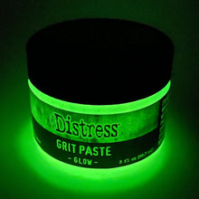 Cargar imagen en el visor de la galería, Tim Holtz - Distress Grit Paste - 3oz - Glow. Tim Holtz Distress Mixed Media Medium Grit Paste - Glow is a texture paste that glows in the dark when exposed to the sun or UV light. It adds a glow effect to spooky projects of all kinds. Available at Embellish Away located in Bowmanville Ontario Canada.