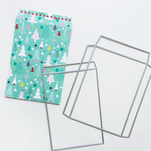 Cargar imagen en el visor de la galería, Catherine Pooler - Dies - Notecard Envelope. Create your own adorable notecard sized envelope with our Notecard Envelope Die. This pair of dies will work with our 6x6" paper to create two cut and scored pieces that you can easily adhere together to create custom envelopes. The envelope is measures at 3 3/4" x 5 1/2" and is a perfect fit for a 3.5" x 5" CP Notecard or 4 Bar sized card base. Available at Embellish Away located in Bowmanville Ontario Canada. Die cut example