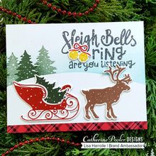 Cargar imagen en el visor de la galería, Catherine Pooler - Stamp Set - Sleigh Ride. What could be better then a ride through the snow? With the Sleigh Ride Stamp Set you can ride through the snow in the back of reindeer drawn sleigh and pull your tree from the forest on the back of your pickup truck. Don't forget you thermos of hot cocoa while out in the snow enjoying your day! Available at Embellish Away located in Bowmanville Ontario Canada. Card made by Lisa Harrolle.
