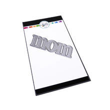 Load image into Gallery viewer, Catherine Pooler - Word Die - Just Mom. Send a card to your favorite mom! The Just Mom Word Die is a simple block font "mom" that will be a cute addition to any card for mother's day or any day celebrating your best lady! Take the "m" and cut one hump off to create "mum"! The Mom Word Die measures approx. 3" x 1". Illustrated by Lisa Kirkbride. Available at Embellish Away located in Bowmanville Ontario Canada.