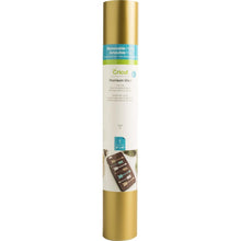 Cargar imagen en el visor de la galería, Cricut - Vinyl 12"X48" Roll - Gold. Ideal for making removable decals, labels, home decor, media covers and other DIY projects! Cut intricate images that adhere but leave behind no stubborn residue. This package contains one 12x48 inch roll of vinyl. Imported. Available at Embellish Away located in Bowmanville Ontario Canada.