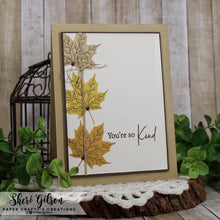 Load image into Gallery viewer, Gina K. Designs - Stamps - Layered Leaves. Layered Leaves is a stamp set by Hannah Drapinski. This set is made of premium clear photopolymer and measures 6" X 8". Made in the USA. Available at Embellish Away located in Bowmanville Ontario Canada. Card design by Shari Gilson.