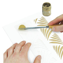將圖片載入圖庫檢視器 Nuvo - Glimmer Paste - 1.7 oz. Nuvo Glimmer Paste can provide unique variety to your work. Use in combination with any stencil to create dimensional strip designs or bring texture and sparkle to larger areas and projects. The high concentration of glitter is sure to add a vibrant shimmer to whatever you are creating. Available at Embellish Away located in Bowmanville Ontario Canada. Glitterati Gold example.