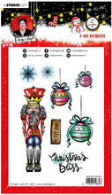 Cargar imagen en el visor de la galería, Studio Light - ABM Clear Stamp - Christmas Nutcracker - Essentials - 148x210x1mm - 1 PC - nr.81. This clear stamp set features a Nutcracker, ornaments, snowflakes and also the perfect Christmas and Winter sentiments. 8 stamps. Size: 5.8x8.3 in. Available at Embellish Away located in Bowmanville Ontario Canada.