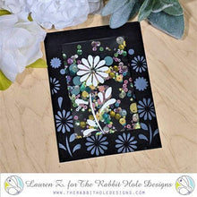 Cargar imagen en el visor de la galería, The Rabbit Hole Designs - 6x6 Stencil - Build your Garden. The Rabbit Hole Designs is proud to bring you our Made in the U.S.A 6x6 Stencils that will soon become an essential in your paper crafting and mixed media projects. You can paint, spray, mist, spritz, airbrush, sponge, doodle, mask, and so more! Try them out on card stock, canvas, cork, chipboard, acetate, and fabric. You are only limited by your imagination. Available at Embellish Away located in Bowmanville Ontario Canada. Card design by Lauren Z.