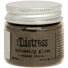 Charger l'image dans la galerie, Tim Holtz - Distress Embossing Glaze - Walnut Stain. Add dimension to your projects with new embossing glaze! These translucent embossing powders are ideal for layering on surfaces. This package contains .49oz of embossing glaze. Conforms to ASTM D 4236. Comes in a variety of colors. Each sold separately. Made in USA. Available at Embellish Away located in Bowmanville Ontario Canada.