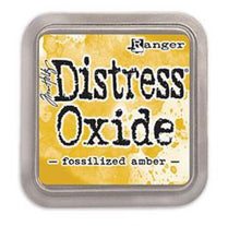 Load image into Gallery viewer, Tim Holtz - Distress Oxide Pad - Large. Create an aged look on papers, fibers, photos and more! This package contains one 2-1/4x2-1/4 inch ink pad. Comes in a variety of distressed colors. Each sold separately. Available at Embellish Away located in Bowmanville Ontario Canada. Fossilized Amber