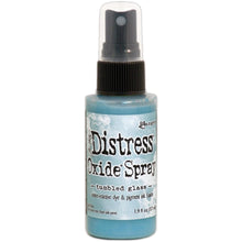 將圖片載入圖庫檢視器 Tim Holtz - Distress Oxide Spray. Creates oxidized effects when sprayed with water. Use for quick and easy ink coverage on porous surfaces. Spray through stencils, layer colors, spritz with water and watch the color mix and blend. Available at Embellish Away located in Bowmanville Ontario Canada. Tumbled lass