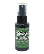 Load image into Gallery viewer, Tim Holtz - Distress Spray - Stain. Spray directly on porous surfaces a quick, easy ink coverage. Mist with water to blend color and get mottled effects. This package contains one 1.9oz. Comes in a variety of colors. Available at Embellish Away located in Bowmanville Ontario Canada. Rustic Wilderness