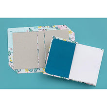Cargar imagen en el visor de la galería, We R Memory - Book Cover Guide - Mint. Perfect book board placement, consistent gaps, trim corners at the proper angle, easily round corners and mark spot for elastic closure. It also includes a scan code for detailed instructions. Available at Embellish Away located in Bowmanville Ontario Canada.