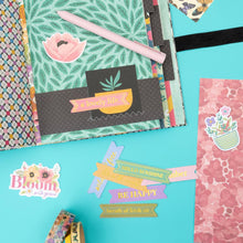 Load image into Gallery viewer, American Crafts -  Ephemera Die-Cuts 66/Pkg - Journaling, Gold Foil - April And Ivy. Introducing April and Ivy by American Crafts- a paper collection that effortlessly combines vintage allure, eclectic flair, and vibrant energy. Available at Embellish Away located in Bowmanville Ontario Canada. Example by brand ambassador.
