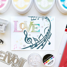 將圖片載入圖庫檢視器 Catherine Pooler - Background Stamp - On Staff. Add some dancing notes to your card background with the On Staff Background Stamp. This red rubber stamp features a winding music staff pattern with notes and musical icons. Available at Embellish Away located in Bowmanville Ontario Canada. Card example by brand ambassador.
