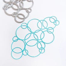 Load image into Gallery viewer, Catherine Pooler - Die - Bubblin'.  Your cards and projects will be bubblin' over with fun when you add the Bubblin' Die. This die of connected bubbles will add a fun element to your card background and could also be used to create a stenciled effect. Available at Embellish Away located in Bowmanville Ontario Canada.
