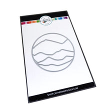 Load image into Gallery viewer, Catherine Pooler - Die - Circle Landscape. Take your scene building up a level with the Circle Landscape Die by adding a backdrop of mountains or water. Or just to add some fun pops of colour. Available at Embellish Away located in Bowmanville Ontario Canada.
