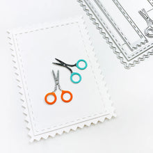 Load image into Gallery viewer, Catherine Pooler - Dies - A Cut Above. The A Cut Above Dies is a pinking cut edge frame die with layers and a little sewn tag die. The tiny snips are just the cutest addition! Available at Embellish Away located in Bowmanville Ontario Canada. Eaxample by brand ambassador.
