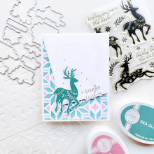 Load image into Gallery viewer, Catherine Pooler - Stamp &amp; Die Set - Peaceful Deer. Create elegant, winter-themed cards. Available at Embellish Away located in Bowmanville Ontario Canada. Example by Catherine Pooler Designs.
