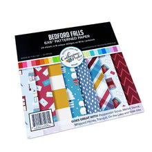 Load image into Gallery viewer, Catherine Pooler - Patterned Paper - Bedford Falls. This paper pack features patterns and prints of life in a sleepy little town. Featuring a print of houses and people out walking their dogs along with post boxes, letters, and snow topped topiaries! Available at Embellish Away located in Bowmanville Ontario Canada.
