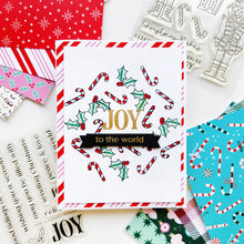 Charger l'image dans la galerie, Catherine Pooler - Sentiment Stamps - Holiday Joy. Designed to pair beautifully with the Festive Joy Word Die, it’s ideal for sending peace, love, and joy this season. Make your festive messages shine with this essential sentiment set! Available at Embellish Away located in Bowmanville Ontario Canada. Example by Catherine Pooler Designs.

