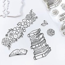 Load image into Gallery viewer, Catherine Pooler - Stamp &amp; Die Set - Floral Fiction. The Floral Fiction Set is full of fun background and decorative elements for birthday, graduation or just because cards Pair these book and flowers with the Owls from the Who's Hoo set. Available at Embellish Away located in Bowmanville Ontario Canada.
