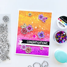 Load image into Gallery viewer, Catherine Pooler - Stamp &amp; Die Set - Floral Fiction. The Floral Fiction Set is full of fun background and decorative elements for birthday, graduation or just because cards Pair these book and flowers with the Owls from the Who's Hoo set. Available at Embellish Away located in Bowmanville Ontario Canada. Example by brand ambassador.
