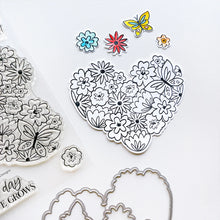 Charger l'image dans la galerie, Catherine Pooler - Stamp &amp; Die Set - Hearts Aflutter. Set someone's heart aflutter with this beautiful stamp set and coordinating dies! The Hearts Aflutter Stamps features a large, line-art heart made of flowers and a butterfly. Available at Embellish Away located in Bowmanville Ontario Canada Example by brand ambassador.
