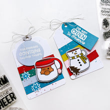 Load image into Gallery viewer, Catherine Pooler - Stamp &amp; Die Set - Holiday Mug. From the makers of the original Mug Shots Stamp Set comes Holiday Mug Shots Stamps and coordinating dies! Features all your favorite winter friends- Santa, Rudolf, Snowman and even the Gingerbread man. Available at Embellish Away located in Bowmanville Ontario Canada. Example by brand ambassador.
