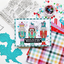 Cargar imagen en el visor de la galería, Catherine Pooler - Stamp &amp; Die Set - Nutcracker Sweet. Meet the cutest nutcrackers in town! This whimsical set features charming nutcrackers adorned in a delightful array of sweets and treats, including cupcakes, candy canes, and figgy pudding. Available at Embellish Away located in Bowmanville Ontario Canada. Example by Catherine Pooler Designs.
