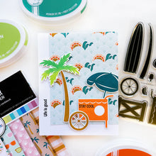 Charger l'image dans la galerie, Catherine Pooler - Stamp &amp; Die Set - On the Boardwalk. This set is perfect for building scenes, clustering or simple cards. This set includes a palm tree, surf board, the boardwalk fence and all the bits to build your own treat cart. Available at Embellish Away located in Bowmanville Ontario Canada. Example by Catherine Pooler Designs.
