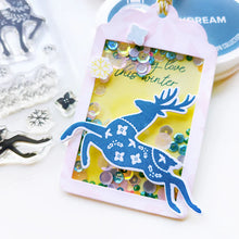 Load image into Gallery viewer, Catherine Pooler - Stamp &amp; Die Set - Peaceful Deer. Create elegant, winter-themed cards. Available at Embellish Away located in Bowmanville Ontario Canada. Example by Catherine Pooler Designs.
