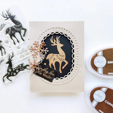 Load image into Gallery viewer, Catherine Pooler - Stamp &amp; Die Set - Peaceful Deer. Create elegant, winter-themed cards. Available at Embellish Away located in Bowmanville Ontario Canada. Example by Catherine Pooler Designs.
