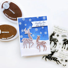 Load image into Gallery viewer, Catherine Pooler - Stamp &amp; Die Set - Peaceful Deer. Create elegant, winter-themed cards. Available at Embellish Away located in Bowmanville Ontario Canada. Example by Catherine Pooler Designs.
