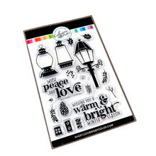 गैलरी व्यूवर में इमेज लोड करें, Catherine Pooler - Stamp &amp; Die Set - Warm &amp; Bright. Light glowing works of art, lamps and lanterns are a classic icon of warmth and home. Features these images with candles and greenery to "decorate" them for the winter season. Available at Embellish Away located in Bowmanville Ontario Canada.
