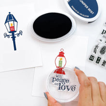 गैलरी व्यूवर में इमेज लोड करें, Catherine Pooler - Stamp &amp; Die Set - Warm &amp; Bright. Light glowing works of art, lamps and lanterns are a classic icon of warmth and home. Features these images with candles and greenery to "decorate" them for the winter season. Available at Embellish Away located in Bowmanville Ontario Canada.
