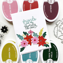Load image into Gallery viewer, Catherine Pooler - Stamp &amp; Die Set - Winter Arrangement. The Winter Arrangement Floral Stamp &amp; Die Set has a variety of stamps to color or layer for creating beautiful wreaths and swags. Create layers using the dies to make your wreath building a breeze. Available at Embellish Away located in Bowmanville Ontario Canada Example by brand ambassador.

