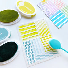 Charger l'image dans la galerie, Catherine Pooler - Stencil - On the Line. Create a fun geometric stripe pattern on your next card or project with the On the Line Stencil. This linear design is super versatile and is easy to ink up in multiple colors. Available at Embellish Away located in Bowmanville Ontario Canada.
