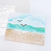 गैलरी व्यूवर में इमेज लोड करें, Catherine Pooler - Stencil - Sand &amp; Sea. This smart stencil has four sides cut to use for blending clouds, waves, and the sandy beach edge. Add texture to the water and sand with the inside elements of the stencil. Add pair of seagulls in the distance. Available at Embellish Away located in Bowmanville Ontario Canada.
