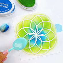 Charger l'image dans la galerie, Catherine Pooler - Stencil - Spirodahlia. Add a doodle-style dahlia to your next card or project with the Spirodahlia Stencil. Grab your ink blending brushes or favorite medium and have fun creating with this large geometric bloom stencil. Available at Embellish Away located in Bowmanville Ontario Canada. Example by brand ambassador.
