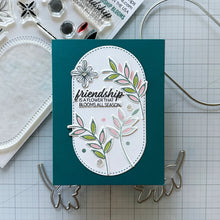 Load image into Gallery viewer, Gina K. Designs - Stamp &amp; Die Set - Friendship Blooms. Friendship Blooms is a stamp &amp; die set by Lisa Hetrick. This set is made of premium clear photopolymer and measures 6" X 8".  Made in the USA. Available at Embellish Away located in Bowmanville Ontario Canada. Example by brand ambassador.
