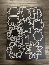 Load image into Gallery viewer, Gina K. Designs - Stamp &amp; Die Set - Snow Much Love. Snow Much Love is a stamp &amp; die set by Gina K Designs. This set is made of premium clear photopolymer and measures 6" X 8". Made in the USA. Available at Embellish Away located in Bowmanville Ontario Canada.

