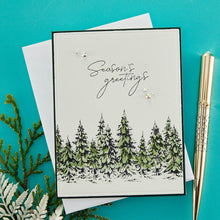 Load image into Gallery viewer, Spellbinders - BetterPress Letterpress Press Plates &amp; Die Set - Seasons Greetings Evergreens. A set of two press plates and one thin metal cutting die. The largest press plate is a line of beautiful evergreen trees which makes a beautiful border. Available at Embellish Away located in Bowmanville Ontario Canada. Example by brand ambassador.
